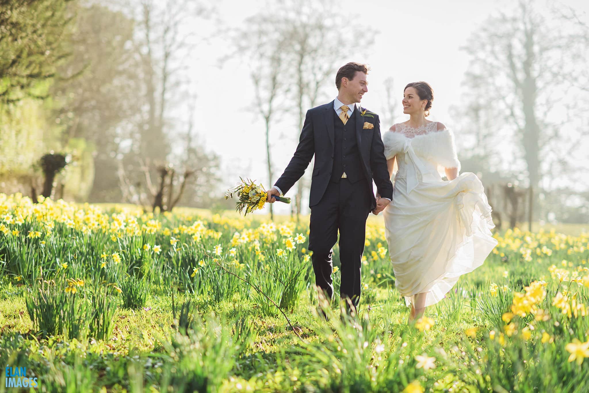 Bride and Groom in the Daffodils at Coombe Lodge 7 Spring Wedding at Coombe Lodge