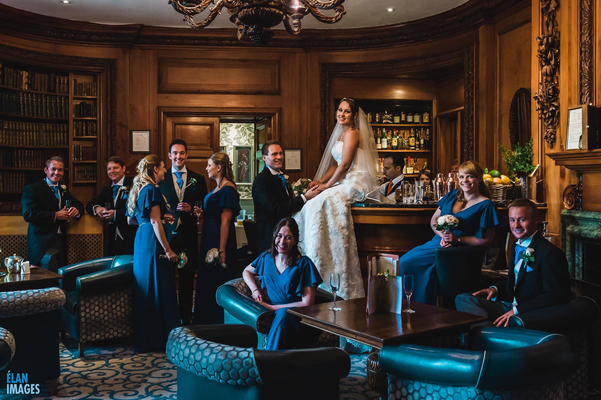 Lainston House Wedding Photography - The Bridal party photographed in the bar
