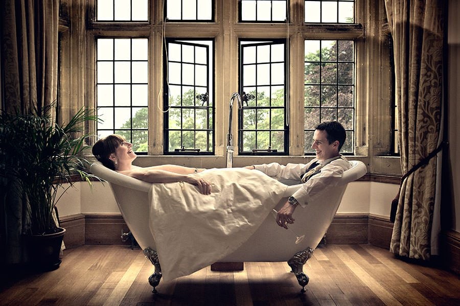 Monkeying around at a wedding - Coombe Lodge, Blagdon 9 Brid eand groom photographed in the Bath at Coombe Lodge