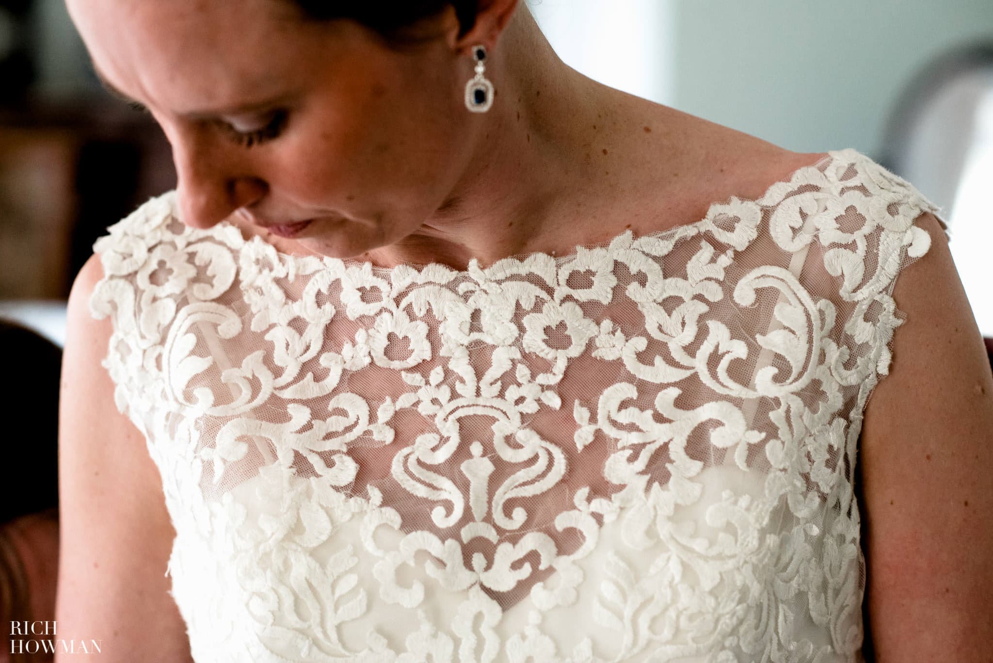 Detail photo of the brides lace wedding dress